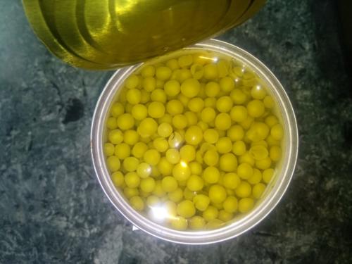 Canned green peas in Tin open tin photo 2